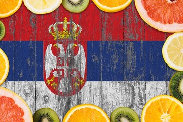 Serbia food concept. Fresh fruits from traditional gardens. Cooking concept on wooden flag...