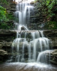 Fototapeta na wymiar Majestic Waterfall on Barton Creek Greenbelt in Austin TX