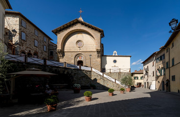 Fototapeta na wymiar The beautiful Piazza Ferrucci and the Propositura of San Niccolò in Radda in Chianti, Siena, Tuscany, Italy