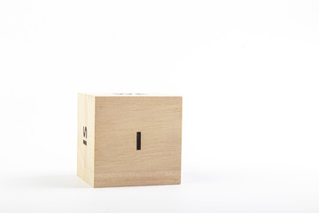 Wooden cubes with the inscription i on a white background