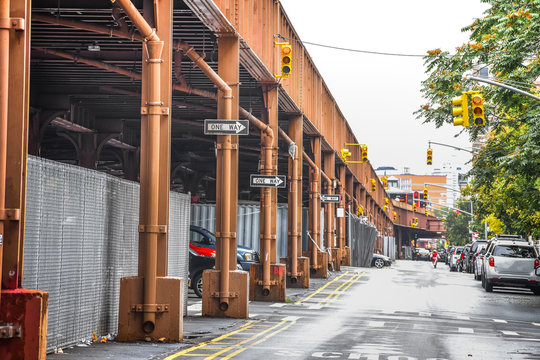 Bottom View Of Elevated Train Track Nyc. Buildings In The Background In A Foggy Day. NYC, USA.