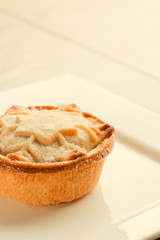 Christmas mince pie on the square white plate