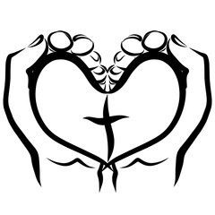 heart with a cross inside in the hands of man