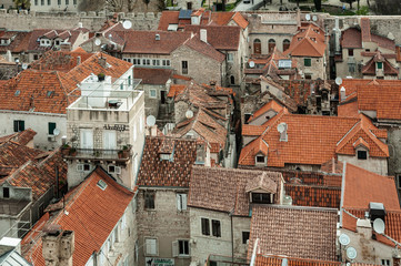 View of traditional croatian architecture with red roofs in the town of Split, Croatia