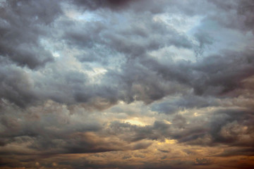 Dramatic sky clouds. Atmospheric clouds. Natural texture. Sunset.