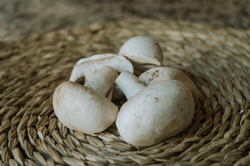 Mushrooms on wicker background