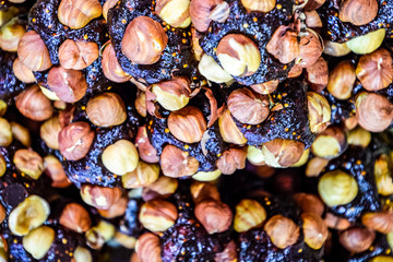 Slices of marmalade with hazelnuts. Hazelnut with sweets.