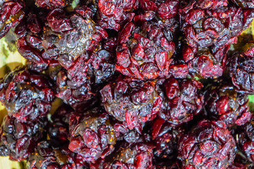 Marmalade, sprinkled with dried berries. Indian sweets