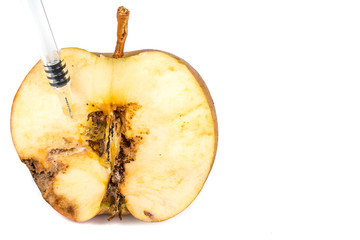 Close up Boring trace of a codling moth Cydia Pomonella, in a half wormy apple. On white...