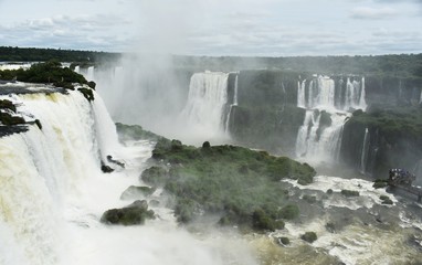 Iguazu Falls or Iguaçu Falls are waterfalls of the Iguazu River on the border of the Argentine and Brazil. Together, they make up the largest waterfall system in the world.