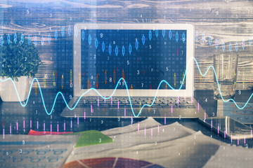 Multi exposure of graph and financial info and work space with computer background. Concept of...