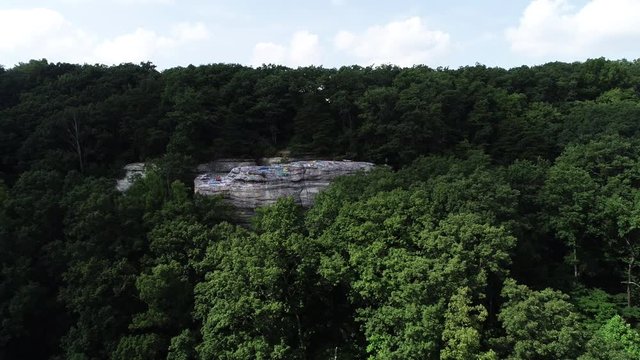 Panning aerial, Graffiti Rock in Kentucky