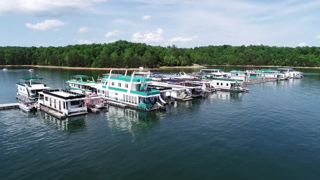 Large boats docked on Laurel River Lake, aerial