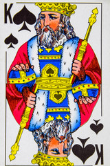 Playing card king of spades, suit of spades.