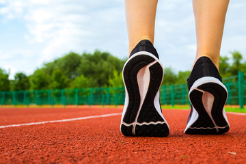 Girl athlete. Stadium running concept. Sport