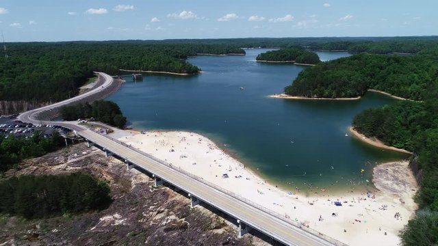Aerial, people on beach in Laurel River Lake