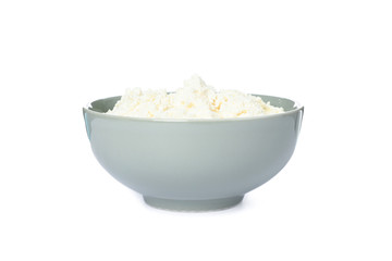 Cottage cheese in bowl isolated on white background