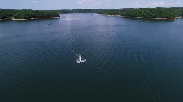 Panning aerial, boats on Laurel River Lake