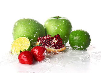 Ripe fresh fruits with water splash on white background