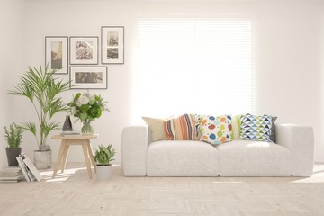Fototapeta premium Stylish room in white color with sofa. Scandinavian interior design. 3D illustration
