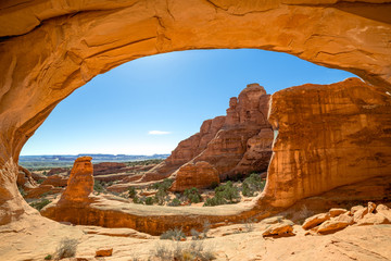 USA, Utah, Grand County, Arches National Park, Klondike Bluffs. A scenic view with Tower Arch...