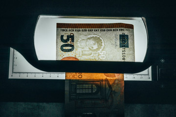 Banknote of 50 euros. authentication. close-up. there is tinting