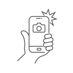 The hand hold the smartphone and photographed with a flash. Photo on smartphone. Editable Stroke