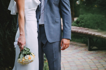 Newlyweds, before the wedding, in love, hold hands