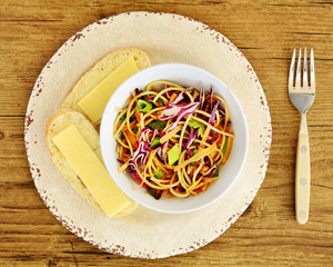 Thai noodle salad with bread and cheese