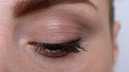 Upset female looking down from shame and guilt, feeling shy insecure, closeup