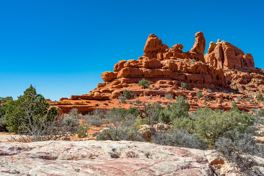 USA, Utah, Grand County, Arches National Park, Klondike Bluffs. A view of sandstone hoodoos and rock fins along Tower Arch hiking trail.