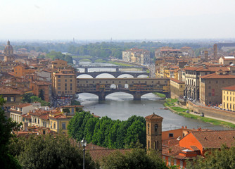 Fototapeta na wymiar Ponte Vecchio and sister bridges over Arno River - Florence, Italy