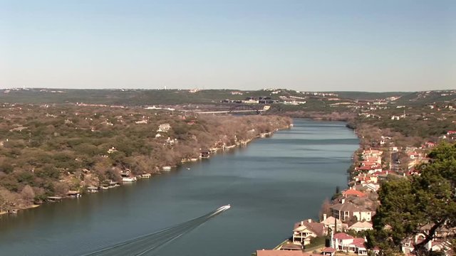 Lake Travis in Austin Texas with affluent neighborhoods lining the banks is favorite for speed boat owners.