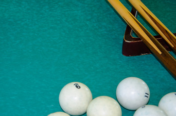 billiard balls on pool table