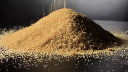 Crystals cane sugar heap close up