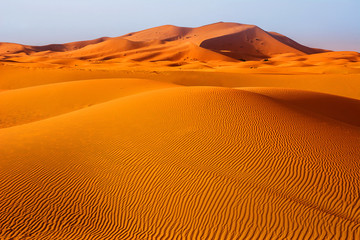 Fototapeta na wymiar Amazing view of sand dunes in the Sahara Desert. Location: Sahara Desert, Merzouga, Morocco. Travel concept. Artistic picture. Beauty world.