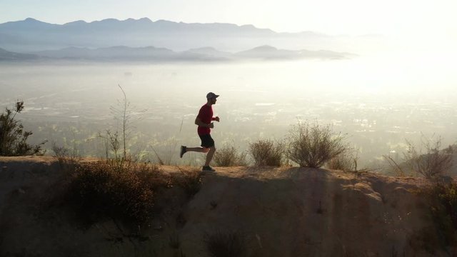 A man going for his moring workout in the hills above Hallywood