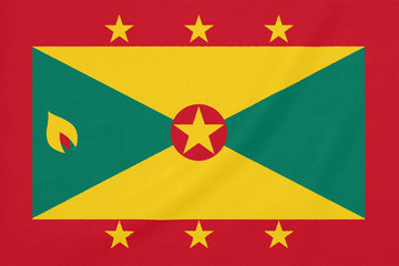 Flag of Grenada on textured fabric. Patriotic symbol - obrazy, fototapety, plakaty
