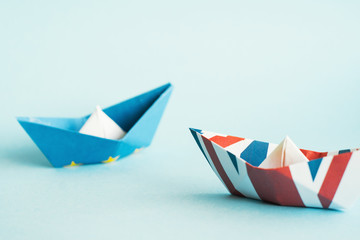 paper ship in Flags of European Union and United Kingdom, Brexit UK EU concept