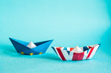 paper ship in Flags of European Union and United Kingdom, Brexit UK EU concept