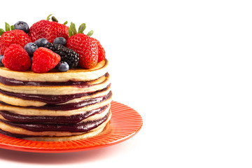Berry Pancakes with Compote Spread Isolated on a White Background