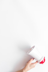 Announcement with megaphone in hand on white background top view mockup