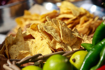 a plate of corn chips nachos in a street cafe
