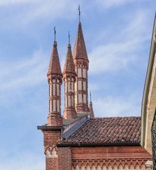 Fototapeta na wymiar decorations made of bricks outside a beautiful Italian medieval church