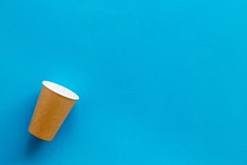 paper cups for coffee to take away on blue background space for text