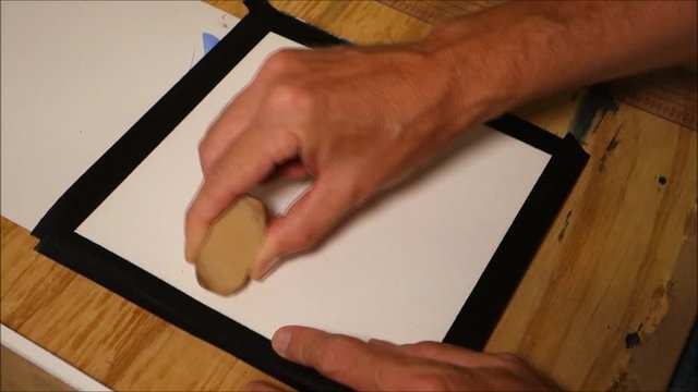 person using erasing pencil line