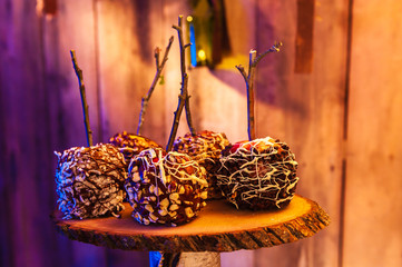 Candy covered apples on a stick.