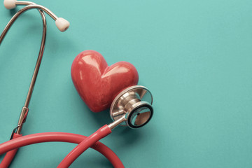 Red heart with stethoscope, heart health,  health insurance concept, World heart day, world health day, organ donor day - obrazy, fototapety, plakaty