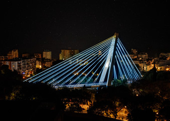 Obraz premium Marbella Bridge illuminated at night with blue LEDs