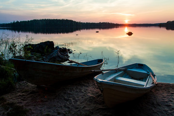 Fototapeta na wymiar Beautiful sunset over lake in the Leivonmaki National Park, Finland